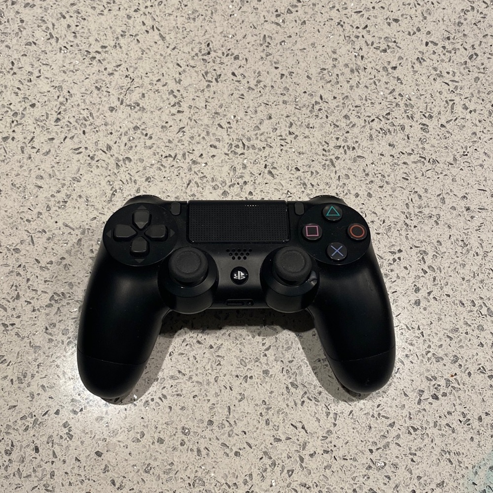 PS4 black controller perfect condition
